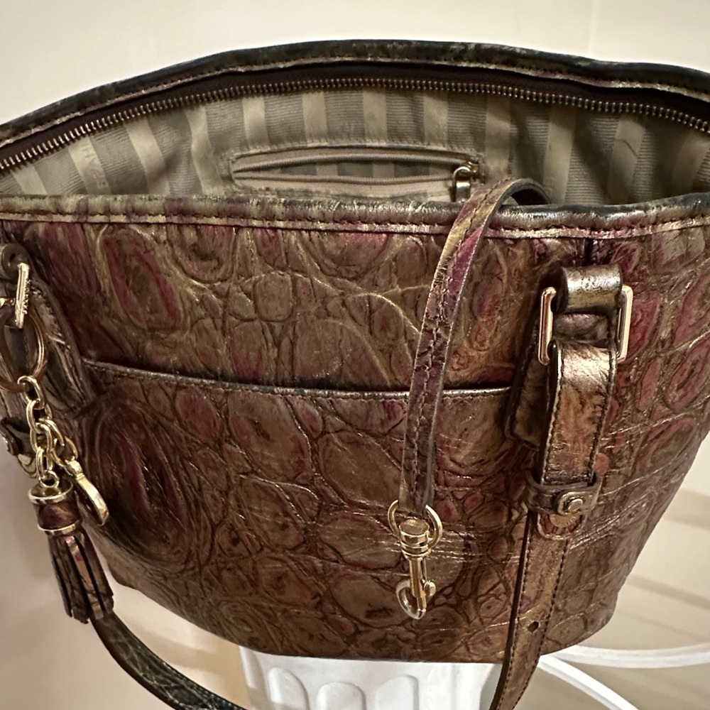 Brahmin leather with sign of use. Beautiful soft authentic leather. Laptop .